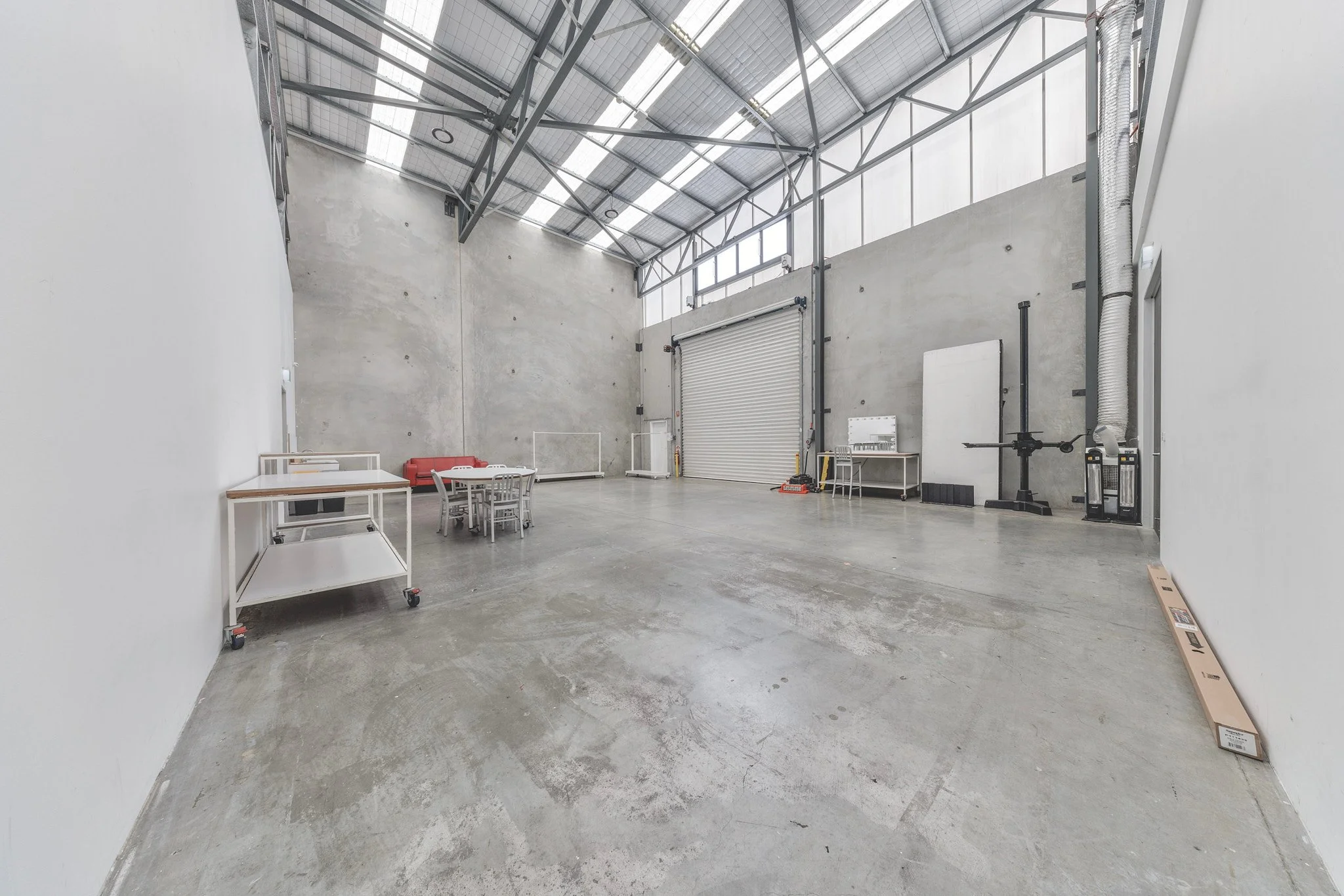 The Front's studio: wide view of the daylight floor under the 9-metre ceiling
