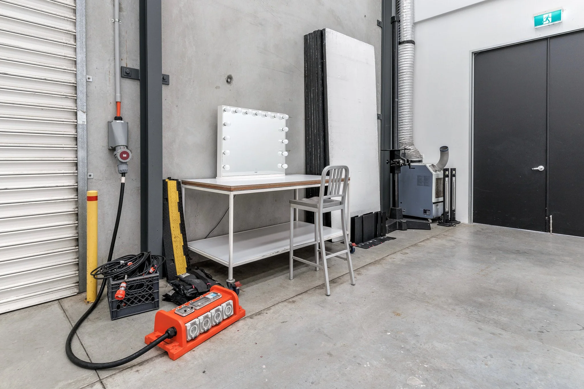 The Front's studio: working area with the roller-shutter vehicle entrance