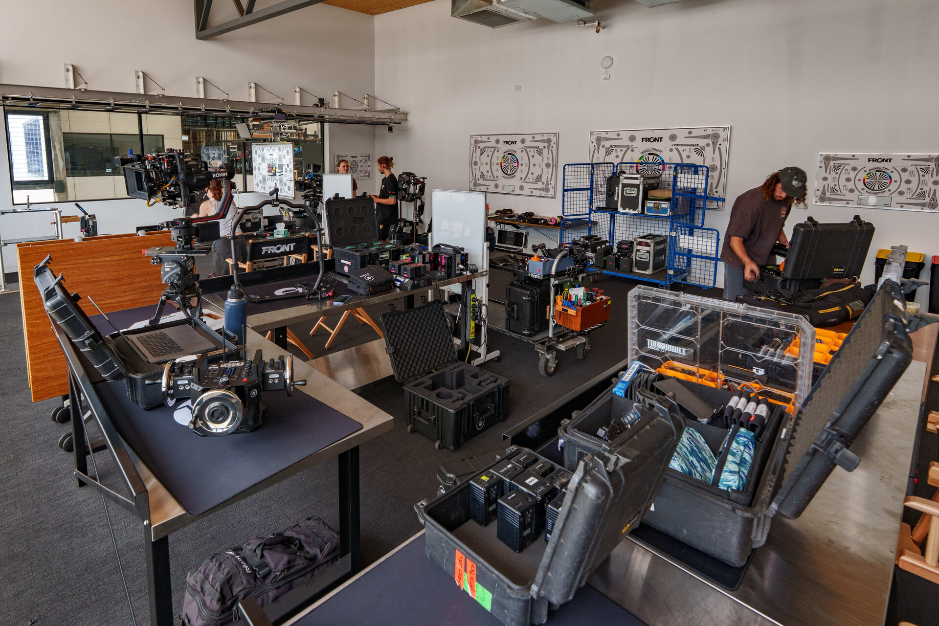 The Front's Test Room: cameras, cases and test charts laid out on the benches